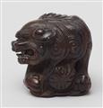 A large dark wood netsuke of a shishi. 19th century - image-2