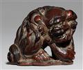 A large dark wood netsuke of a shishi. 19th century - image-1