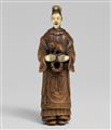 An ivory and wood shunga netsuke of a Chinese lady with a shishi. 19th century - image-1