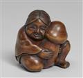 A boxwood shunga netsuke of Okame. 19th century - image-1