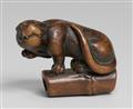 A boxwood netsuke of a tiger on bamboo. First half 19th century - image-1