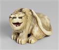 An ivory netsuke of a seated tiger, in the manner of Hakuryu. First half 19th century - image-1