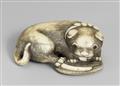 A large ivory netsuke of a puppy with a straw sandal. Late 18th/early 19th century - image-1