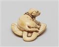 An ivory netsuke of a dog on an uchiwa. First half 19th century - image-4