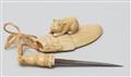 An ivory netsuke of a cat on a hand broom. 19th century - image-4