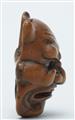 A wood netsuke of an Oni mask. 19th century - image-3