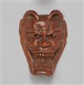 A wood netsuke of a demon mask. Late 19th century - image-1