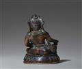 A Tibetan or Nepalese silver-inlaid dark bronze figure of Jambhala. 17th/18th century - image-2