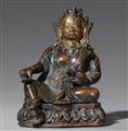 A Tibetan or Nepalese silver-inlaid dark bronze figure of Jambhala. 17th/18th century - image-1