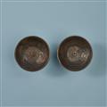 Two cast iron candlesticks - image-2