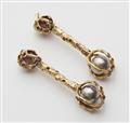 A pair of 18k gold Tahiti pearl drop earrings - image-2