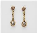 A pair of 18k gold Tahiti pearl drop earrings - image-1