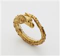 A 18k gold Etruscan style bangle - image-1