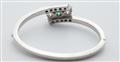 A 14k gold emerald and diamond bangle - image-4