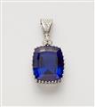 An 18k white gold pendant with a large tanzanite - image-1
