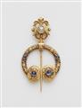 A 14k gold Celtic style fibula brooch - image-1