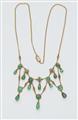 An 18k gold emerald necklace - image-1