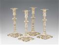 A set of four George II silver candlesticks - image-1