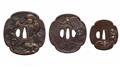 A pair of large iron daishô tsuba and one iron tsuba. 19th century - image-1