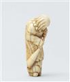 An ivory netsuke of a foreigner with a shawm. Early 19th century - image-2