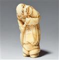 An ivory netsuke of a foreigner with a shawm. Early 19th century - image-1