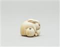 An ivory netsuke of a hare with a biwa-fruit. Second half 19th century - image-4