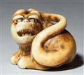 An ivory netsuke of a tiger. Mid-19th century - image-1