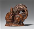 A boxwood netsuke of a cockerel and chicken. Mid-19th century - image-1