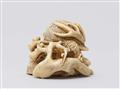 An ivory netsuke of a kabuto on plum branches. Second half 19th century - image-4