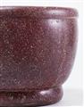 An important red porphyry mortar - image-2