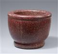 An important red porphyry mortar - image-1