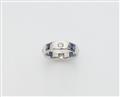 An Art Déco 18k white gold eternity ring - image-1