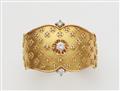 An 18k gold diamond cuff bangle - image-1