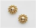 A pair of 14/18k gold clip earrings - image-1