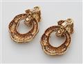 A pair of 18k gold and diamond clip earrings - image-2