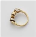 An 18k gold sapphire trinity ring - image-2