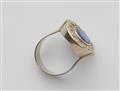 An 18k white gold diamond and sapphire ring - image-2