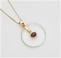 An 18k gold ruby and quartz pendant necklace - image-1