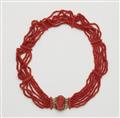 A 14k red gold coral necklace with a shell cameo clasp - image-1