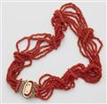 A 14k red gold coral necklace with a shell cameo clasp - image-2