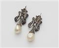 A pair of silver and diamond earrings with large natural pearl drops - image-2
