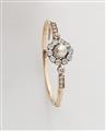 A Belle Epoque 18k red gold pearl and diamond bangle - image-1