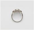 A Belle Epoque 18k white gold diamond solitaire ring - image-2