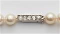 A pearl sautoire with a 14k white gold diamond clasp - image-2
