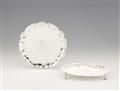 A pair of George II silver salvers - image-1