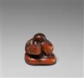 A boxwood netsuke of a Okame with a box. 19th century - image-1