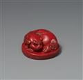 A red lacquer netsuke of a shishi. 19th century - image-1