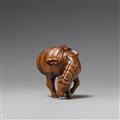 A boxwood netsuke of a grazing horse. Early 19th century - image-1