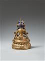 An important Tibetan bronze figure of Vajrasattva with inscription to the base. 15th/16th century - image-2