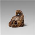 A boxwood netsuke of a large eagle - image-1